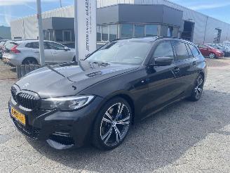 Coche siniestrado BMW 3-serie Touring 330d M xDrive High Executive AUTOMAAT 2020/7